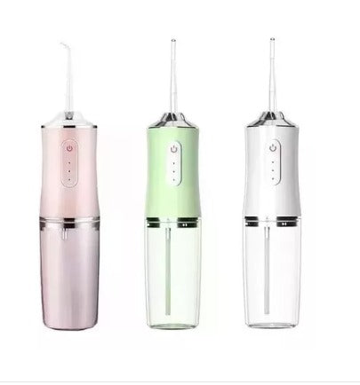 Irrigador dental portátil em três cores