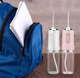Irrigador dental com bolsa de transporte e bicos