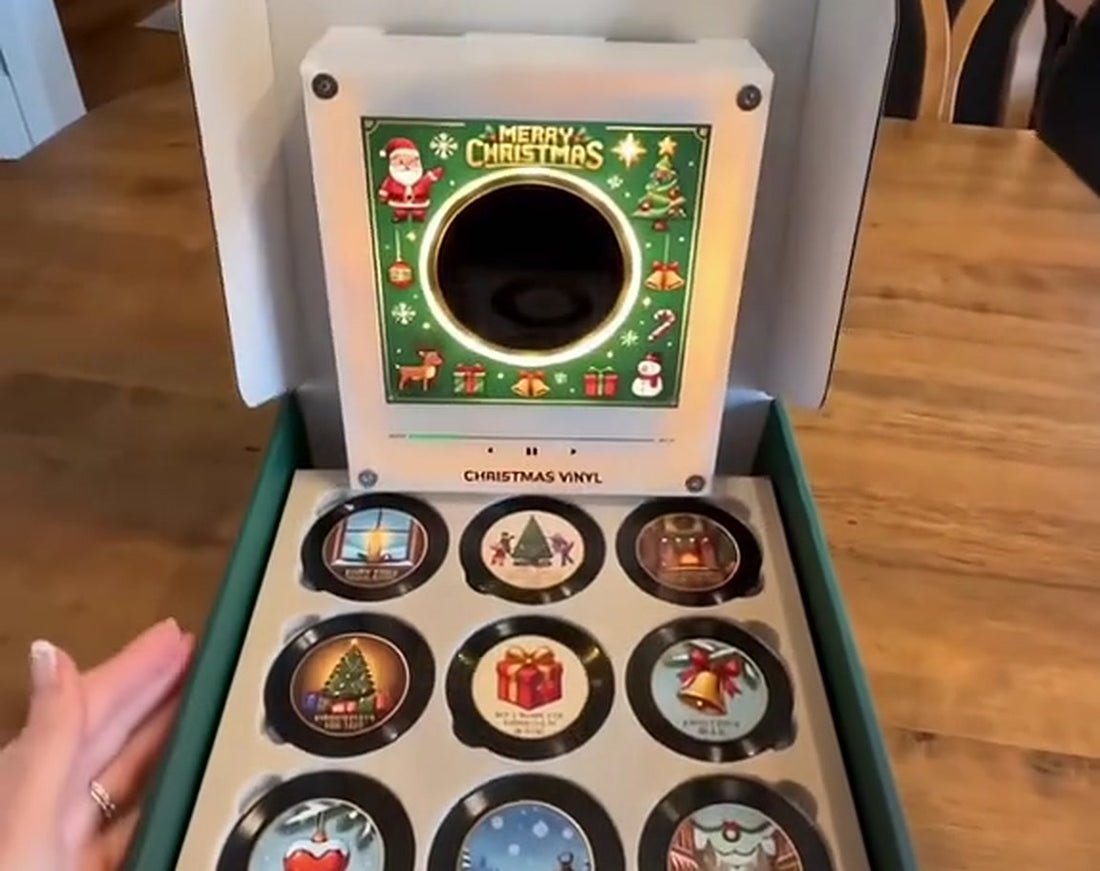 Caixa do mini gira-discos de Natal com os 9 mini discos
